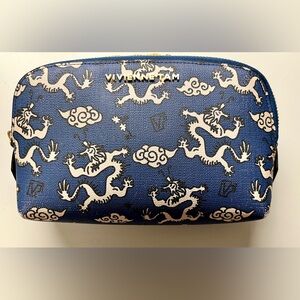 Vivienne Tam Blue Clutch with White Dragon Motif